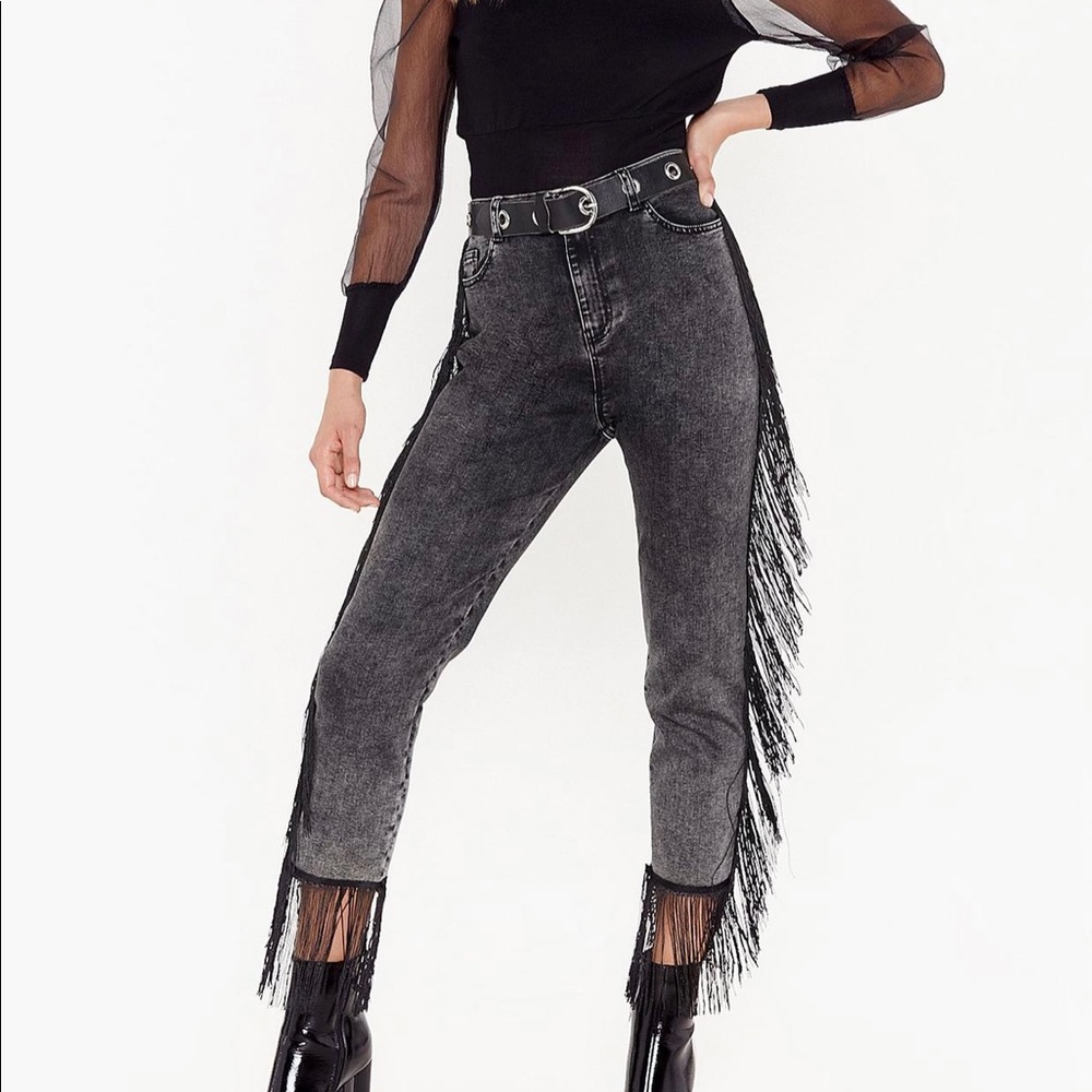 Black acid wash fringe jeans